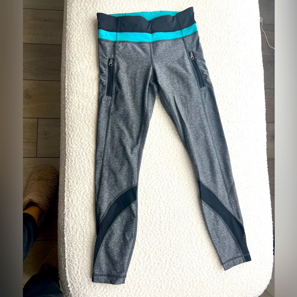 Lululemon sz 4 teal black gray zip pocket mesh calf mid waist - Inspire II tight